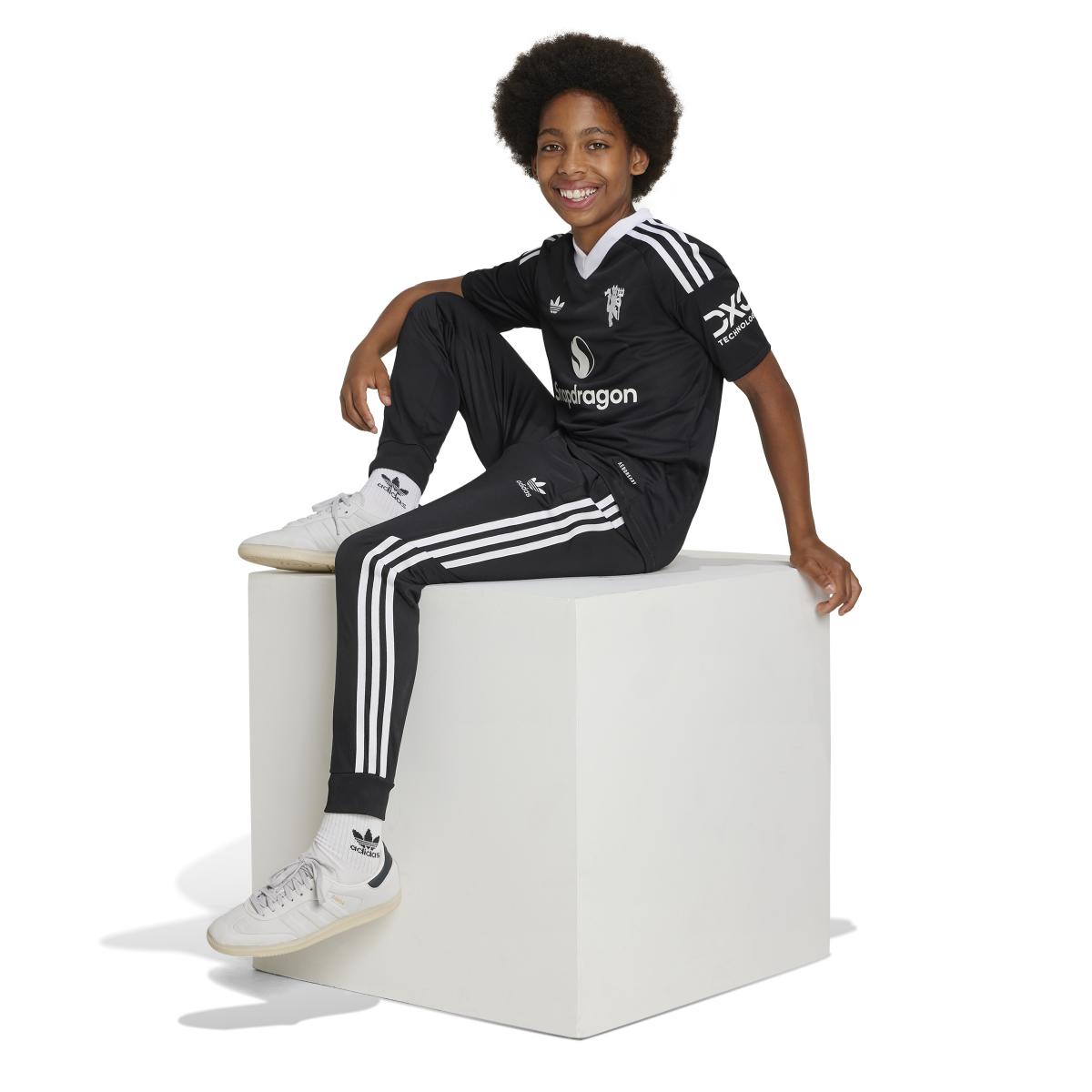 product/a/d/adidas_jh0841_6_apparel_on_model_walking_view_white.jpg