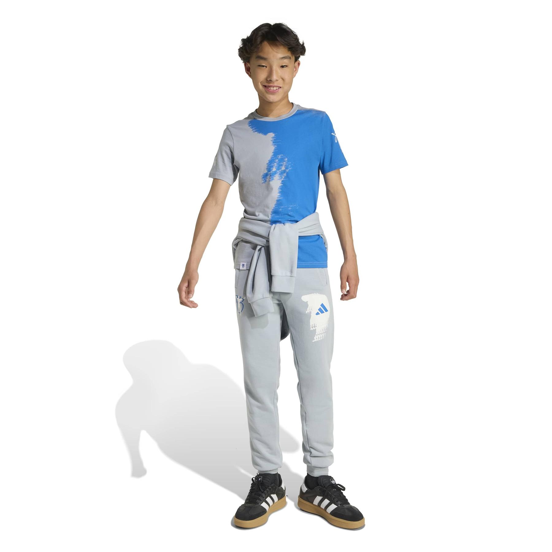 product/2/0/2025_09_adidas_jx6310_4_apparel_on_model_walking_view_white.jpg