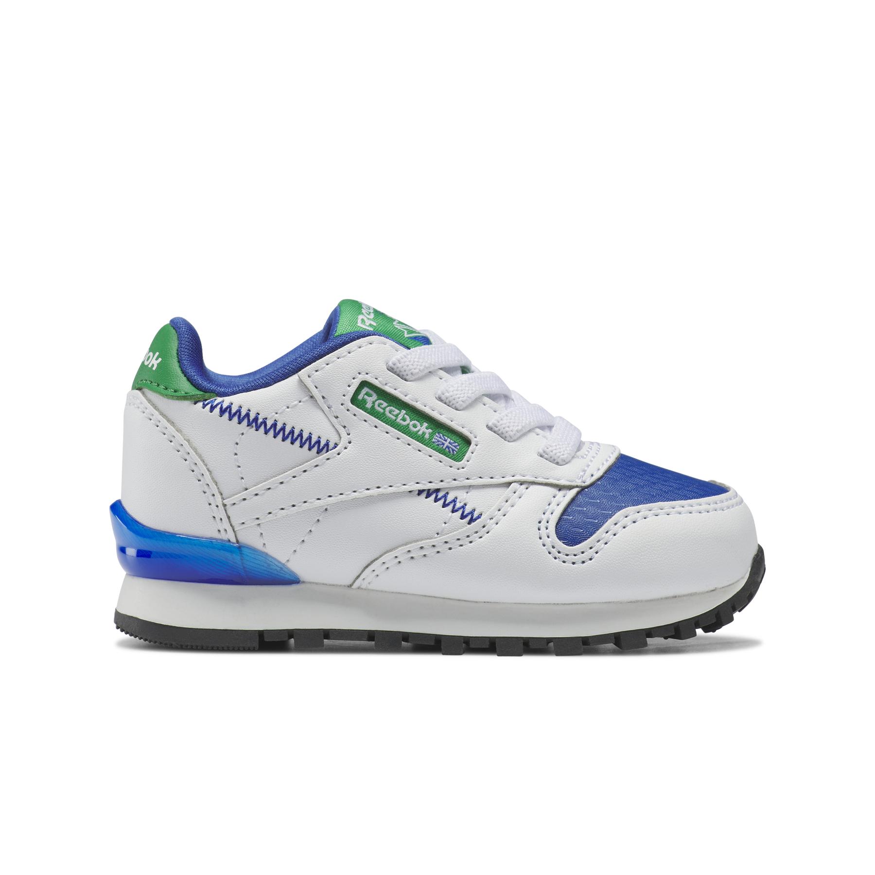 product/r/e/reebok_hr1067_1_footwear_photography_side_lateral_center_view_white.jpg