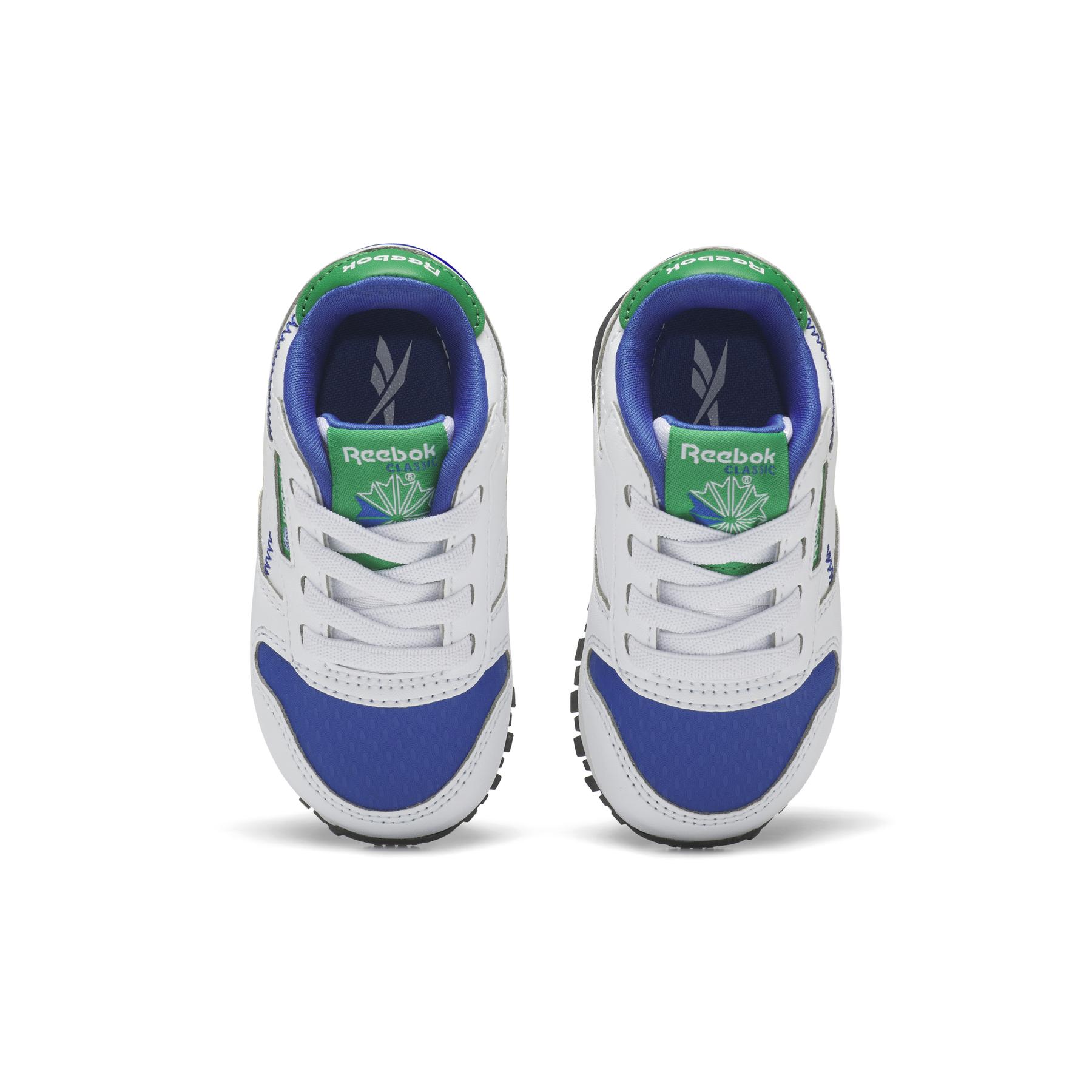 product/r/e/reebok_hr1067_2_footwear_photography_top_portrait_view_white.jpg